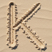 Sand type letter K