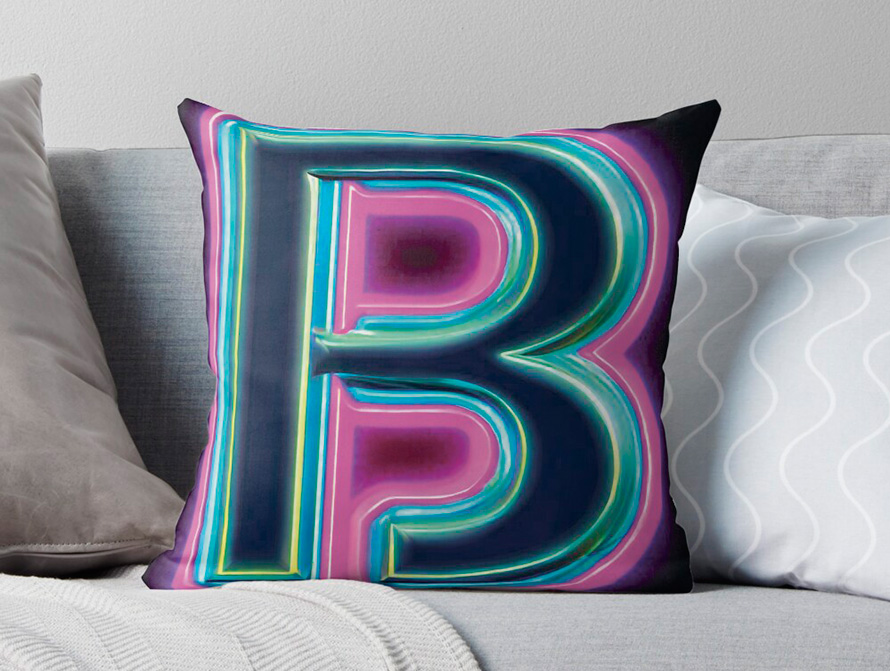 Neon letter throw pillow