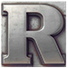 Metal type letter R