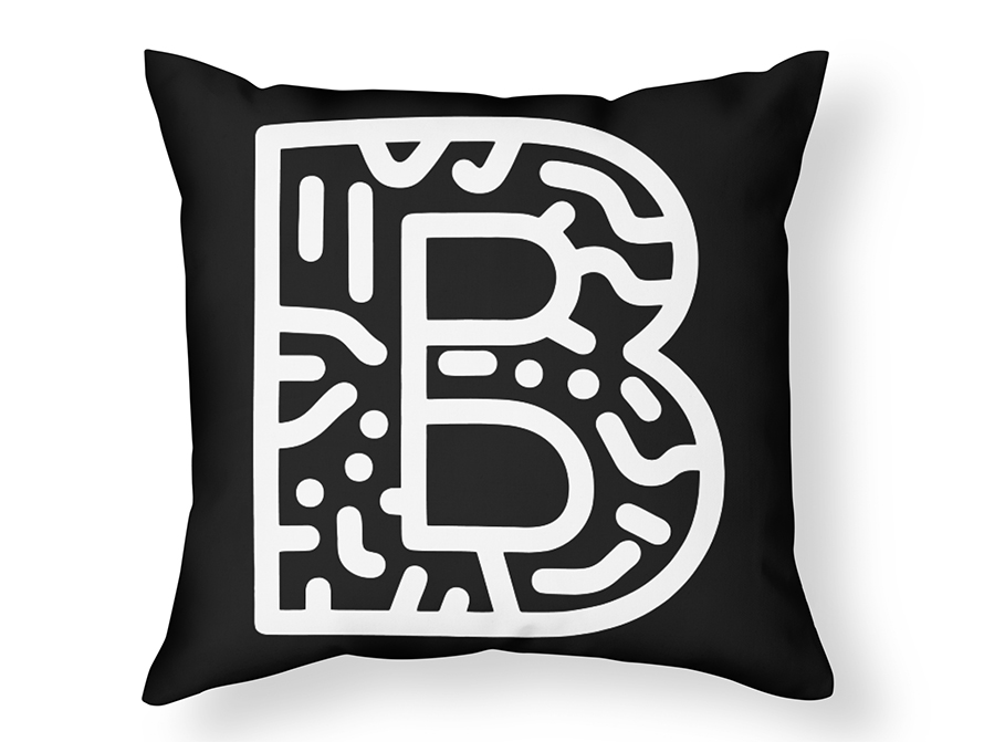 Squiggle letter thrown pillow