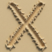 Sand type letter X